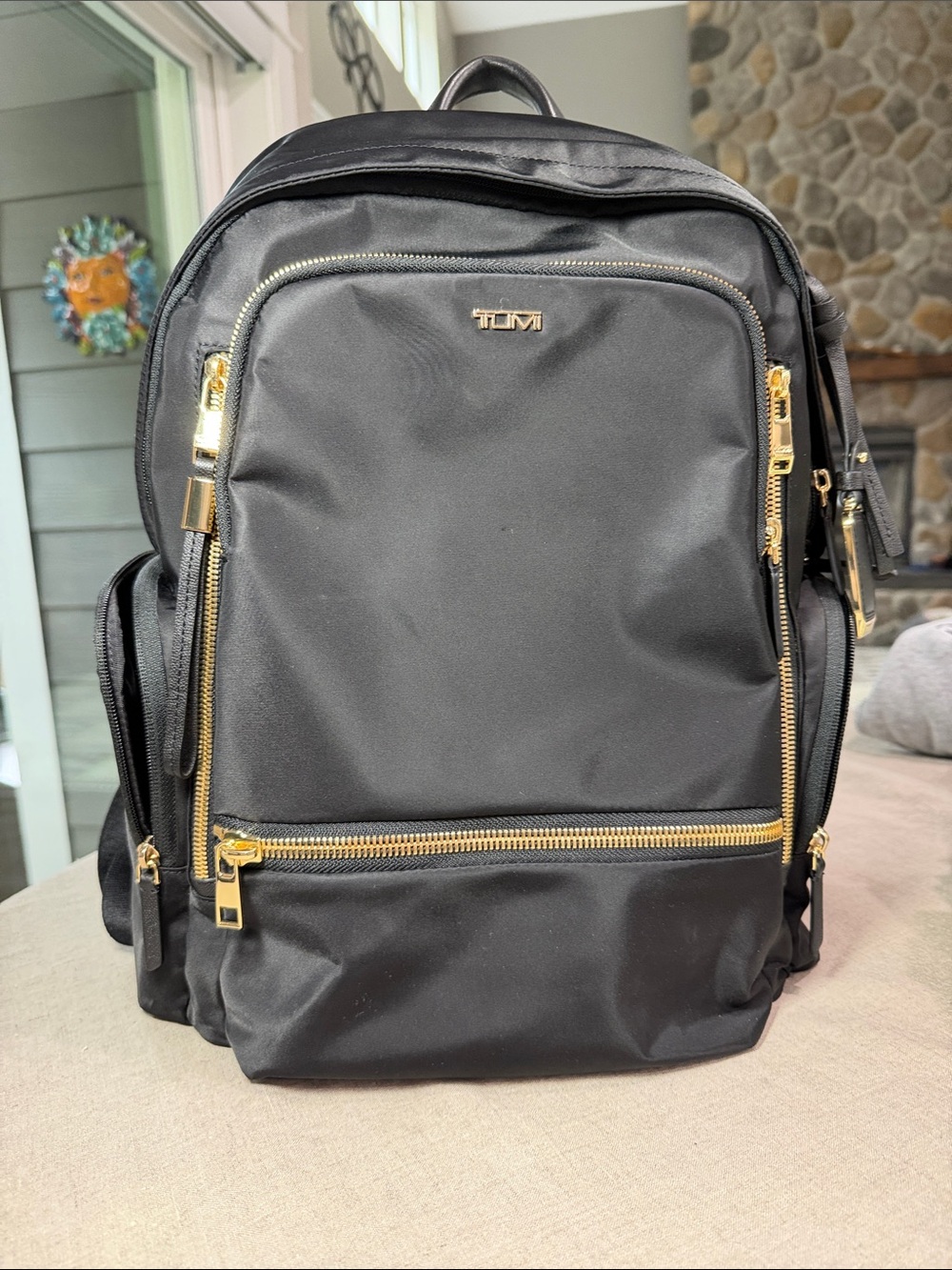 Tumi Black Backpack with Gold Hardware